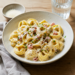 Tortellini med ricotta og spinat i tomatsauce